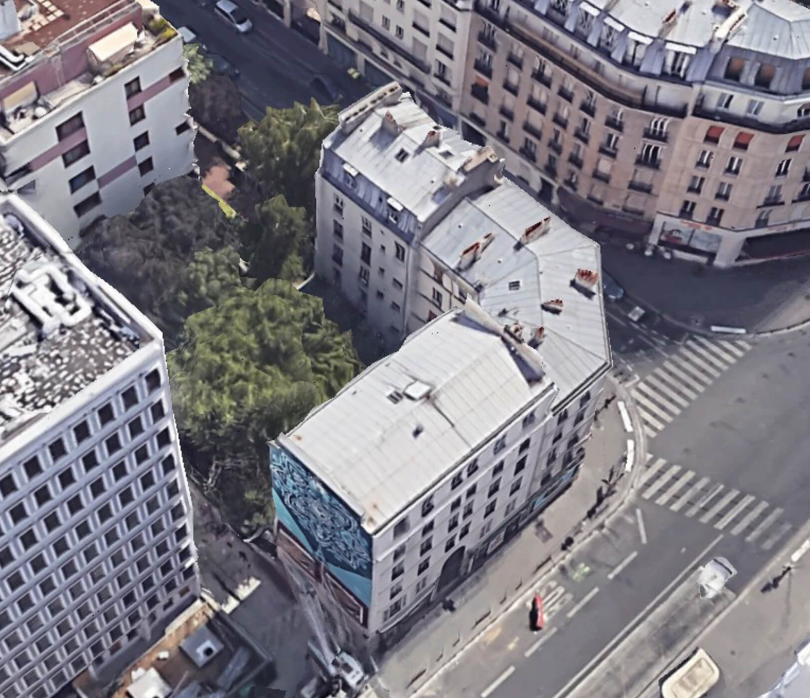 Photo d’une vue aérienne de l’immeuble habité concerné par le projet de réhabilitation plan climat rue Jeanne d’Arc montrant l’accès par la rue mais aussi le jardin à l’arrière