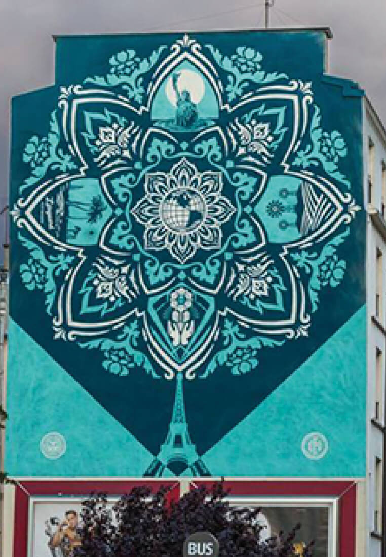 Photo de la fresque d’Obey sur le côté de l’immeuble concerné par le projet de réhabilitation plan climat rue Jeanne d’Arc